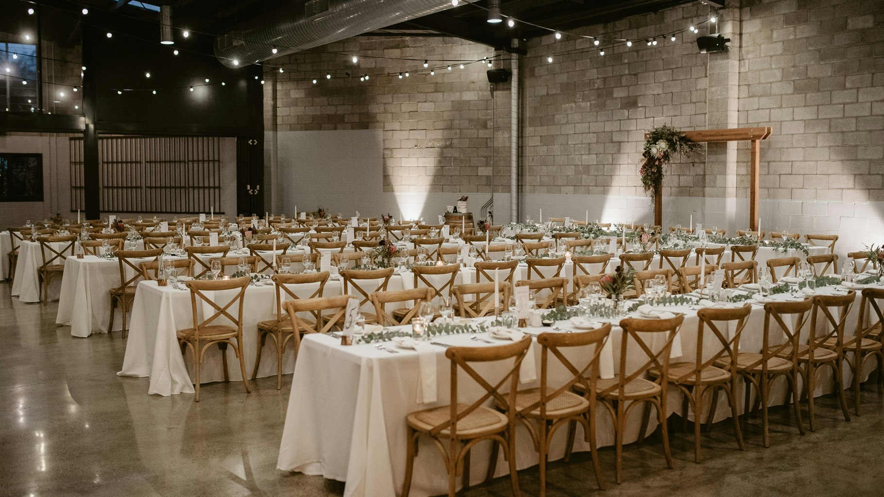 Table settings styled for a wedding reception.